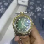 ساعتين من رولكس تقليد حلوه مايبن انها اصل