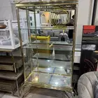 ارفوف ذهبي زجاج فخم جدن