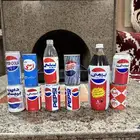 علب وزجاج بيبسي قديم