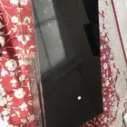 طاولة زجاج سوداء