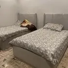 سريرين الطول مترين والعرض 120 ودولاب ومكتب لشخصين للبيع