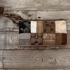 شنطة صغيرة كوتش اصليه يوجد بليرينا طقم معاها تباع لوحدها