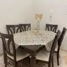 طاولة سفرة من الهوم سنتر ب 8 كراسي  .قابلة للفتح والتسكير