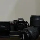 للبيع كاميرا نيكون Nikon D5100 مع العدسات شبه جديدة