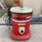 أسطوانة غاز ومكنسة كهربائية