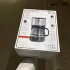 آلة قهوه سوداء