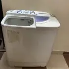 غسال وفرن كبير وفرن كهربائي صغير
