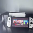 نيتندو سويتش OLED مستعمل نظيف جدا لعبتين ماريو