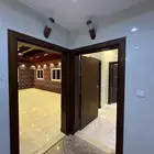 شقة للإيجار غرفتين وصاله وسطح في حي الفلاح