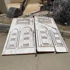 باب كراج حديد ثقيل درفتين ارتفاع 2.75 م وعرض2.90 م