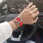 ساعة فوسيل ارنج ناري جذابه ملفته   عينك ميزانك