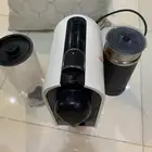 الة قهوة كبسولات وحامل كبسولات