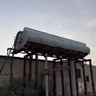 خزان ماء للبيع مع مواصيره