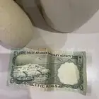 خمسة ريالات الملك فيصل تحمل الرقم (52)