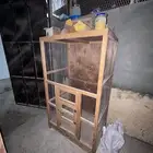 قفص خشب لطيور الزينه