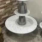 طاوله دايرية مع 6 خدمه صغير