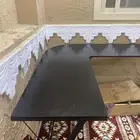 طاولة L ا