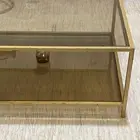 طاولة قزاز لون ذهبي