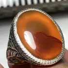 خاتم عقيق زجاجي مزعفر ومصور