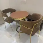 طاولة استيل ذهبي