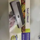 جهاز تفريغ الهواء والتغليف Seal A Meal