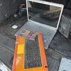 لابتوب وكيبورد ومبرد