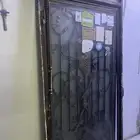 باب حديد مشغول للباب الخارجي للبيت