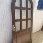 باب خشبي مع قزاز