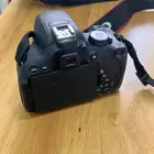 كاميرا كانون مع عدساتها وستاند