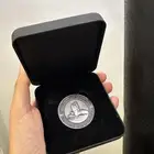 ميداليتان شعار مركز الملك عبد العزيز الثقافي العالمي (إثراء)