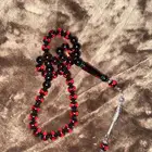 سبحة بكلايت عنابي حرباء