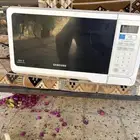 مايكرويف ومكنسه كهربائيه