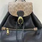 شنطة ماركة كوتش اصلية ميئه في الميئه