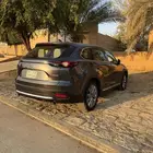 مازدا cx9 فل كامل رمادي داخل  بيج