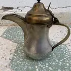دلة وابريق وقدر ختمين و غضارة