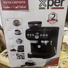 ماكينه صنع القهوه بيها مطحنه جديذه لا يتم استخدمها