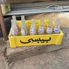 سلات وعلب ببسي وكولا تراث
