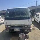 اعرض لكم دينا ميتسوبيشي 2002 وايت