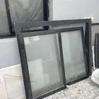 باب حديد وشباك المنيوم وخزنه وسط وارفف