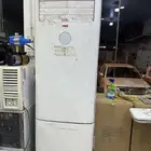 مكيف دولابي وجهاز كاشير