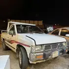 السياره نيسان مسروقه من يجدها الاتصال ع الرقم