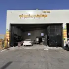 ورشة للتقبيل شاحنات