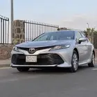 كامري 2019 أستاندر فضي ماشيه 90 الف