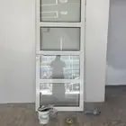 باب الأمنيون مع زجاج الطول مترين و6ونص س العرض مترين ونص