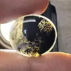 عقيق يماني مصور اسدين في وجه الحجر واسد في بطن الحجر