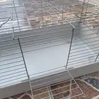 قفص كبير مره بدون اي شي له بابين واحد من فوق كبير واحد وصغي