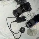 كمره سوني احترافيه الفا  a100 مع عدسه 300mm وعدسه 75 mm
