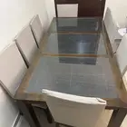 طاول سفرة 8 كراسي بحالة ممتازه