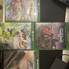 xbox one s مع يدتين تحكم وأربع اشرطه وقاعده شحن