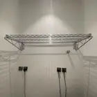 رف علاقي بالجدار كروم
